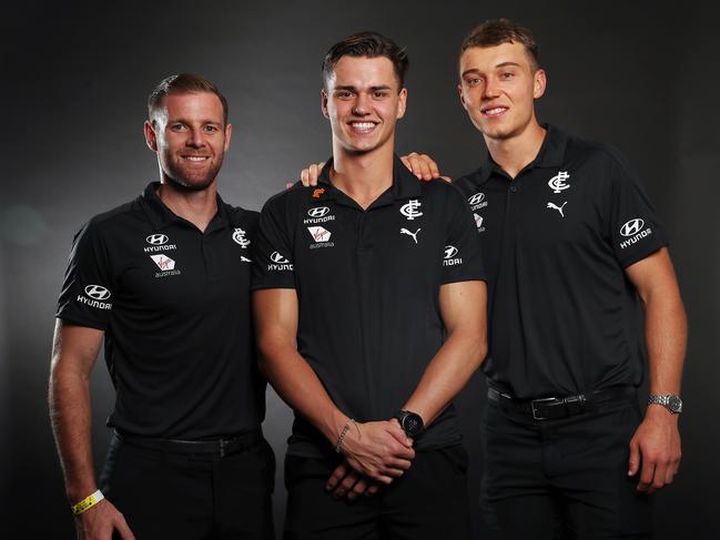 AFL Draft at Marvel Stadium.  27/11/2019.  Carlton co captains Patrick Cripps and Sam Docherty with number 20 pick Sam Philip   . Pic: Michael Klein