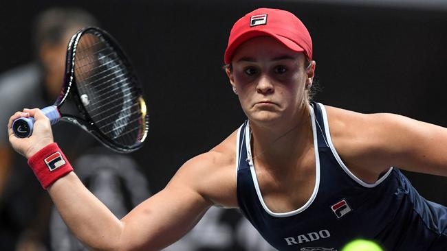 Ashleigh Barty hits a return during her victory over Elina Svitolina at the WTA Finals in Shenzhen. Picture: AFP