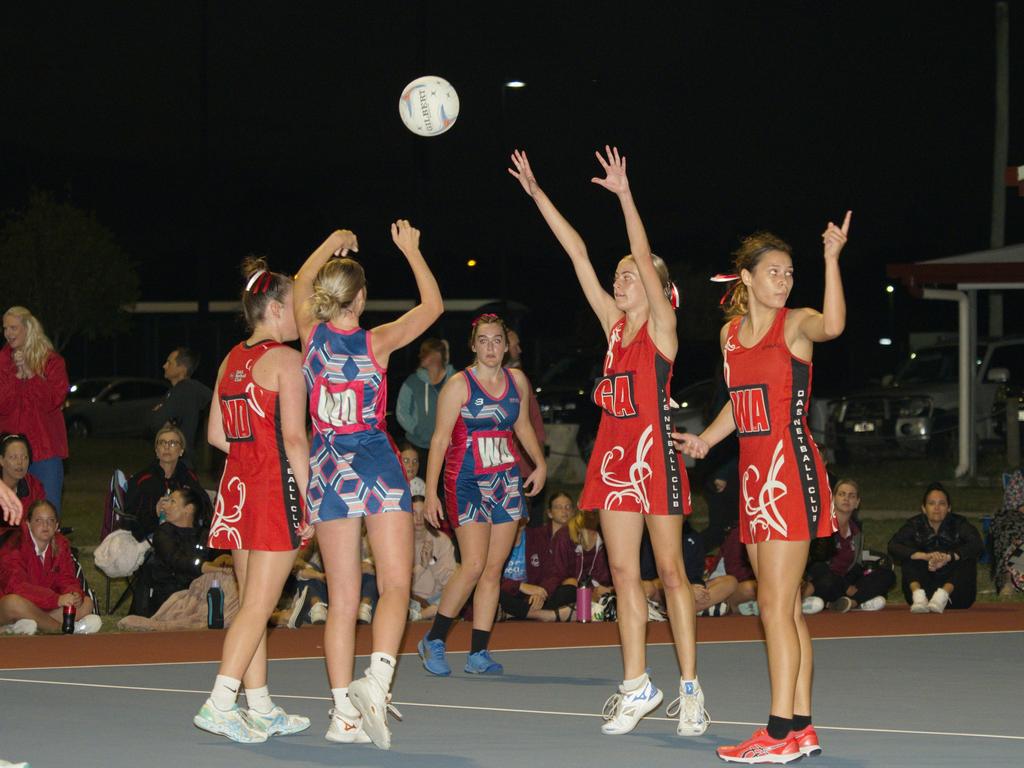 Sophie Dinsdale, Storm player, passes the ball to Sophie Ruggeri in a handover to Darcie Turton in the 2021 Mackay Netball Association seniors grand final. September 4th, 2021 Picture: Marty Strecker