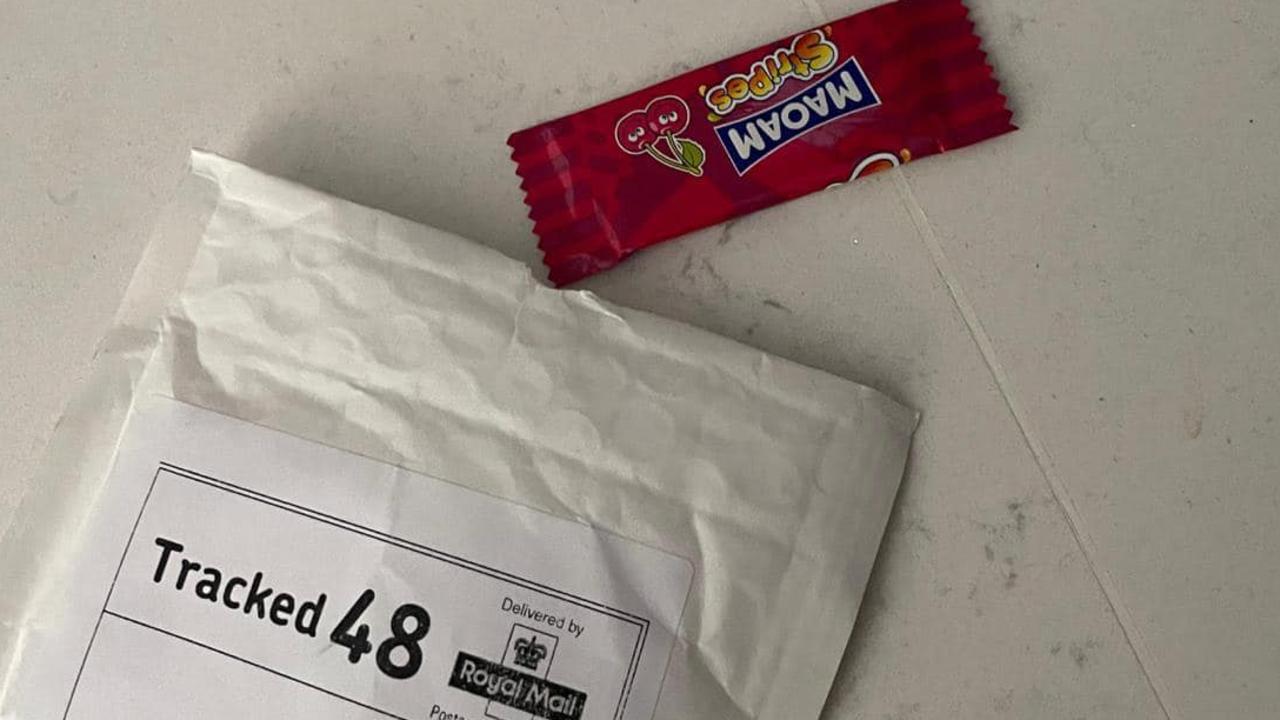 A sinister explanation has been given for the unsolicited delivery of an envelope containing a singular lolly.