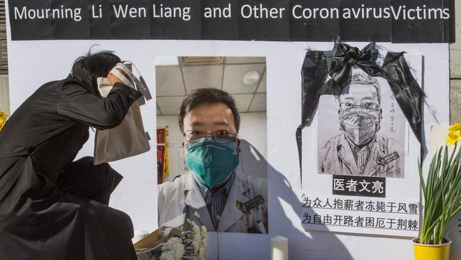 Chinese students and their supporters at a memorial for Dr Li Wenliang, who was the whistleblower of coronavirus that originated in Wuhan and caused the doctor’s death.