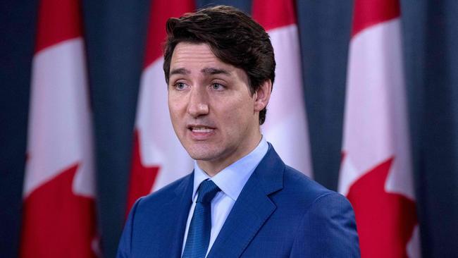 (FILES) In this file photo taken on March 07, 2019 (FILES) In this file photo taken on March 07, 2019 Canadian Prime Minister Justin Trudeau speaks to the media at the national press gallery in Ottawa, Ontario. - Prime Minister Justin Trudeau on April 5, 2019, warned of the risk of interference by Russia in Canadian parliamentary elections scheduled for this fall. "We've seen over the past number of years an increase in the interference or the implication of foreign actors in democratic processes," Trudeau told a news conference in Toronto. (Photo by Lars Hagberg / AFP)