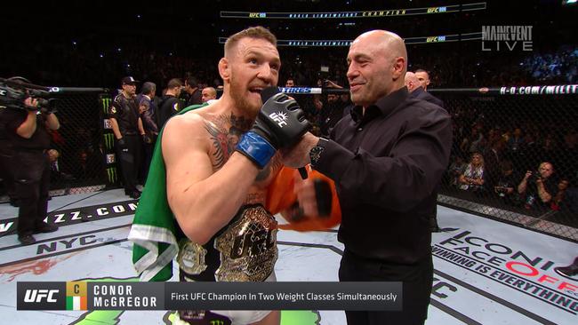 Conor mcgregor hotsell ufc belts