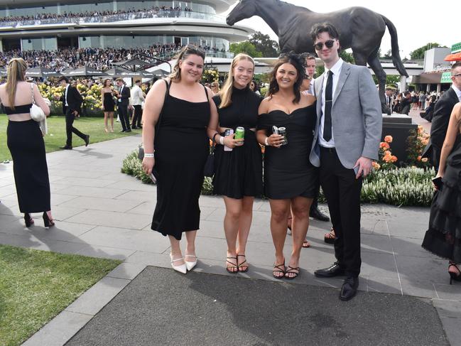 Guests in striking racewear at Penfolds Derby Day at the Flemington Racecourse on Saturday, November 02, 2024: