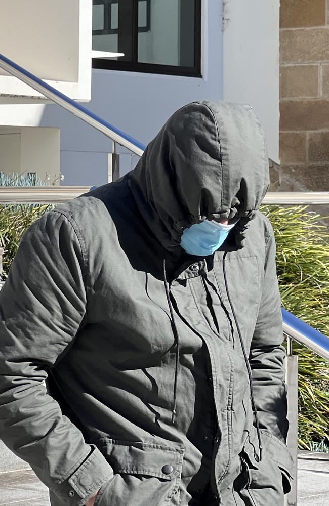 Kais Dahdal was unmasked inside Wollongong Courthouse, but opted to completely cover up as he left the building. Picture: Dylan Arvela