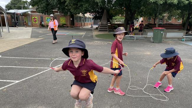 Students Izzy Ryan and Ellie Riordan play skip rope at lunchtime in the playground at St Joseph's Catholic School at Rochester.