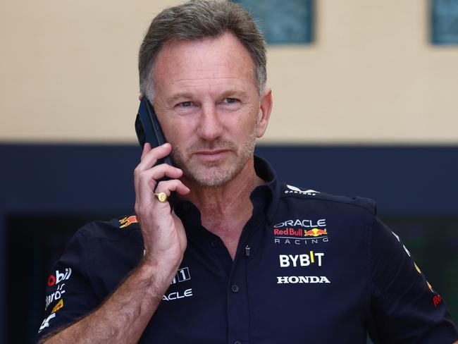 BAHRAIN, BAHRAIN - FEBRUARY 29: Oracle Red Bull Racing Team Principal Christian Horner talks on the phone in the Paddock prior to practice ahead of the F1 Grand Prix of Bahrain at Bahrain International Circuit on February 29, 2024 in Bahrain, Bahrain. (Photo by Clive Rose/Getty Images)