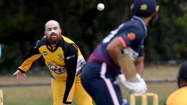 Werribee’s Mathew Palmer sends one down against Yarraville. Picture: Andy Brownbill