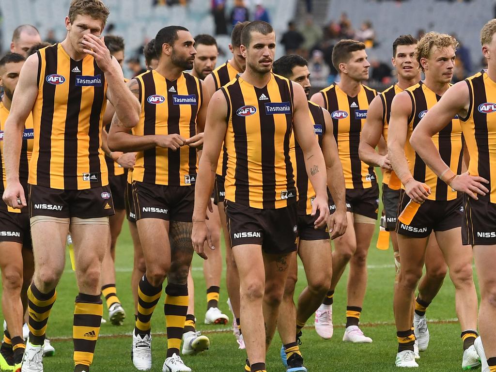 The Hawks react after the Round 2 AFL match between the Hawthorn Hawks and the Western Bulldogs at the MCG in Melbourne, Sunday, March 31, 2019. (AAP Image/Julian Smith) NO ARCHIVING, EDITORIAL USE ONLY