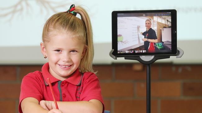 Junior school teacher Laura Kenny with Madeline Page. Photo: Annette Dew