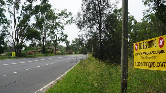 A sign opposing the rezoning of Cecil Park hangs across the road from where a business park has been proposed on Elizabeth Drive. Pic: Tony Ibrahim