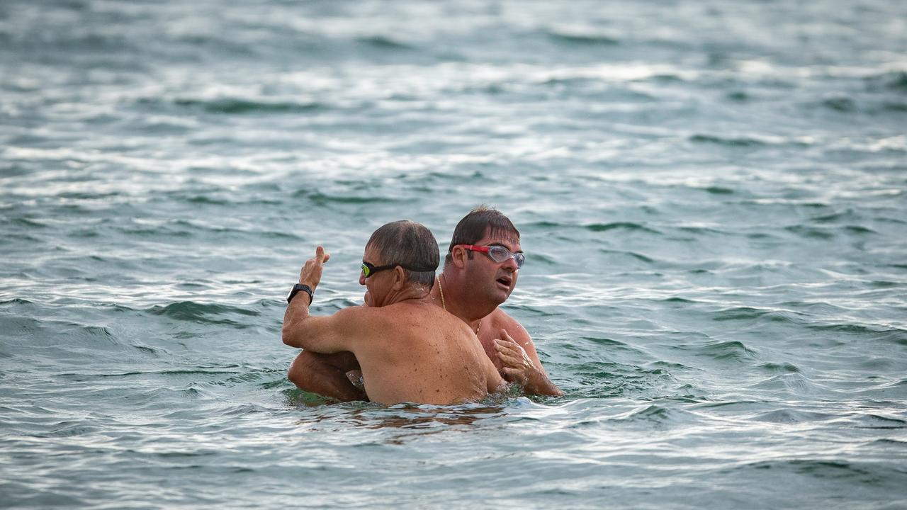 Early morning swimmers were back in the water as the community grieves the tragic loss. Picture: Julian Andrews