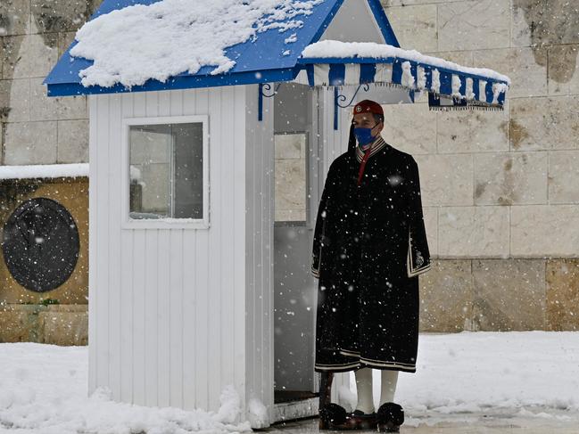 A Greek Evzoni Presidental Guard in central Athens. Greece has extended lockdown as virus cases surge. Picture: AFP