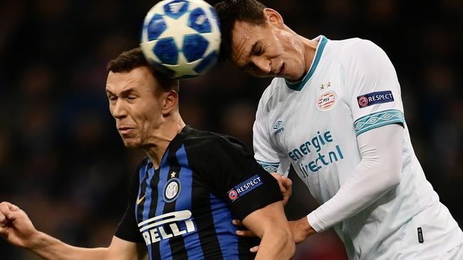 PSV defender Trent Sainsbury (right) getting some rare action for the club in December’s Champions League clash at Inter Milan. Picture: AFP 