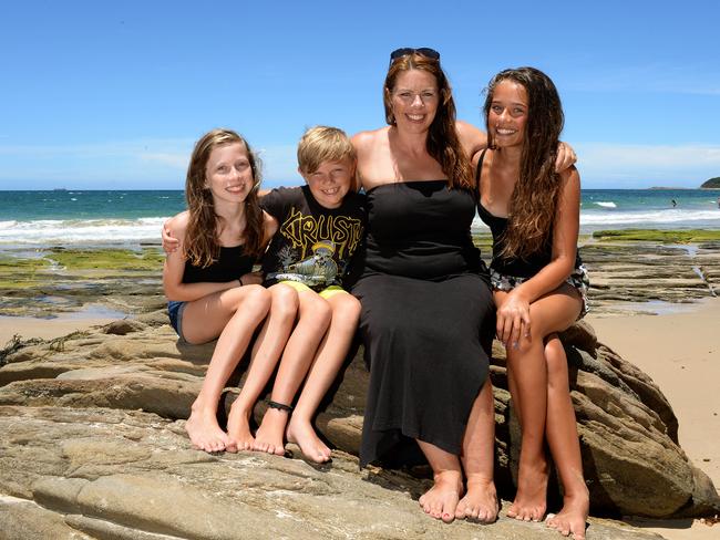 Like other buyers snapping up beach houses at budget prices, the Langworthy family live close to the beach but not right on the waterfront in Budgewoi. Picture: Peter Lorimer