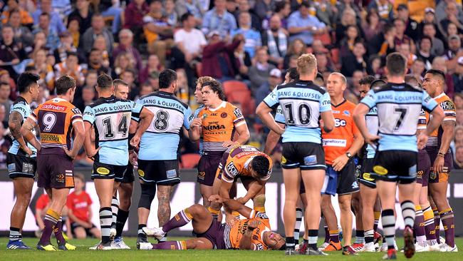 Play was stopped after Jamayne Isaako landed awkwardly following the collision. Picture: Getty