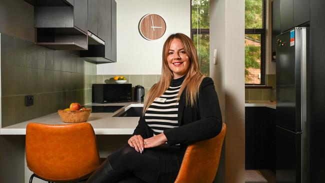 Agent Karina Highman at the Norwood unit she is selling. Picture: Naomi Jellicoe