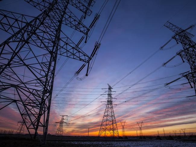 The silhouette of the evening electricity transmission pylon. Istock