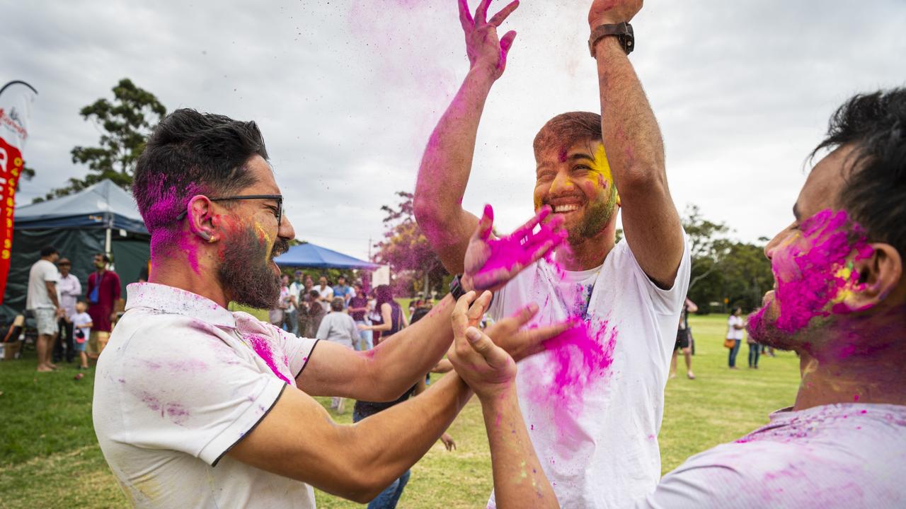 Celebrating Holi are (from left) Nikesh Giri, Bishal Bhandari and Janak Khadka as Toowoomba Indian and Nepalese communities unit for the festival of colours, Saturday, March 23, 2024. Picture: Kevin Farmer