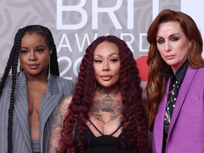 Members of the British band Sugababes Mutya Buena, Keisha Buchanan and Siobhan Donaghy poses on the red carpet upon arrival for the BRIT Awards 2023 in London on February 11, 2023. (Photo by ISABEL INFANTES / AFP) / RESTRICTED TO EDITORIAL USE â NO POSTERS â NO MERCHANDISEâ NO USE IN PUBLICATIONS DEVOTED TO ARTISTS