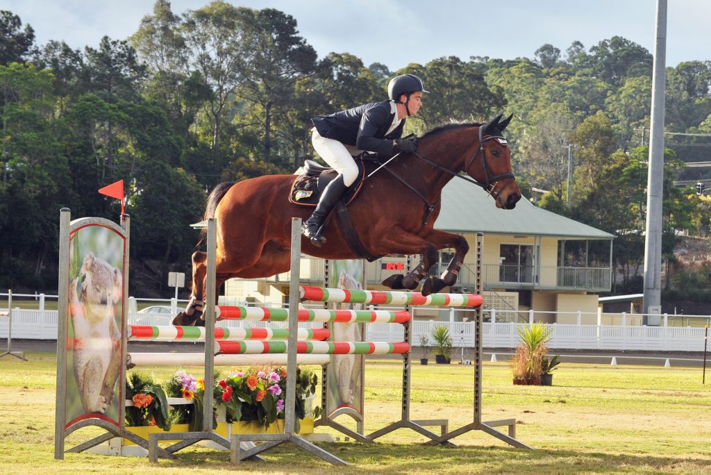 Horse jumping championships at Nambour see some spills | The Courier Mail