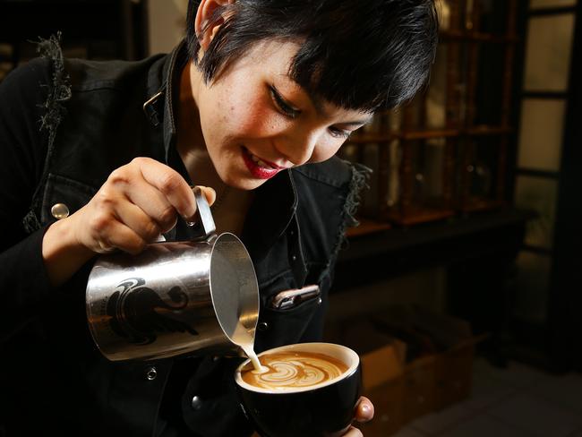 Jibbi Little doing her latte art.