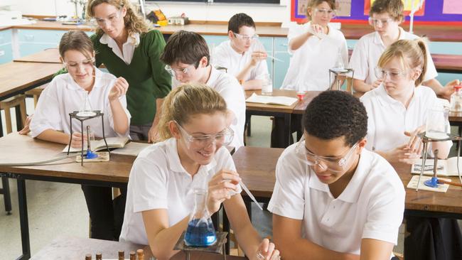 Generic stock image education Schoolchildren and Teacher in Science Class