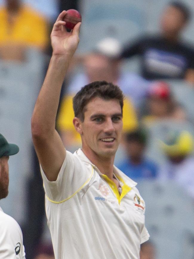 Cummins salutes after his Michelle. Picture: AP