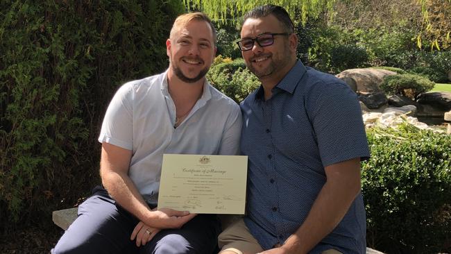 Mathew Campbell, right, with his husband and co-accused Stewart Iain Berry, left, on their wedding day.