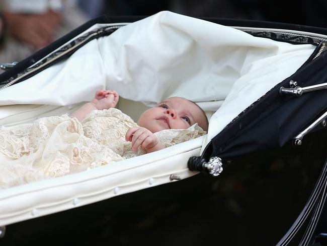 Britain’s Princess Charlotte is pushed in a pram after her christening at St. Mary Magdalene Church in Sandringham, England, Sunday, July 5, 2015. Picture: AP