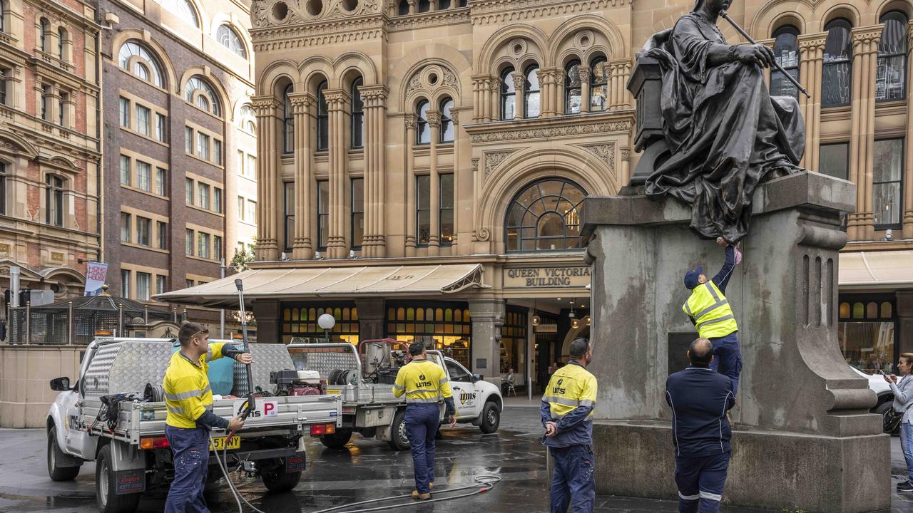 Cleaners pictured working to clean the iconic statue. Picture: NewsWire / Monique Harmer