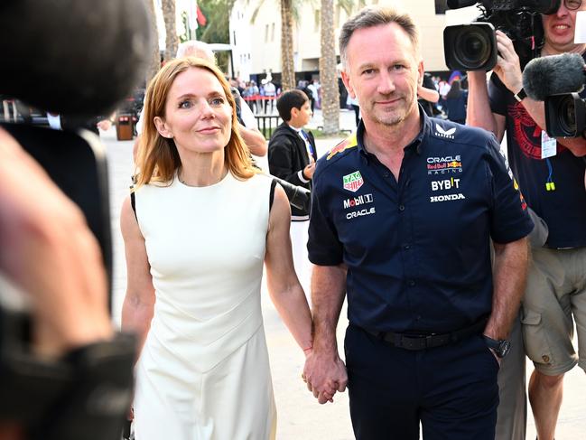 BAHRAIN, BAHRAIN - MARCH 02: Oracle Red Bull Racing Team Principal Christian Horner and Geri Horner walk in the Paddock holding hands prior to the F1 Grand Prix of Bahrain at Bahrain International Circuit on March 02, 2024 in Bahrain, Bahrain. (Photo by Clive Mason/Getty Images)