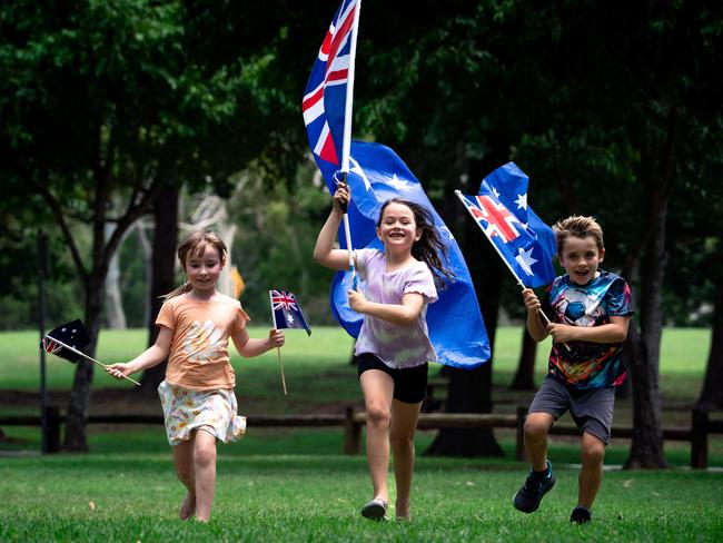 Summer Dunn, 7, Emelia, 7, and Logan Delport, 6, enjoy their Australia Day celebrations in Parramatta Park. Photo: Tom Parrish