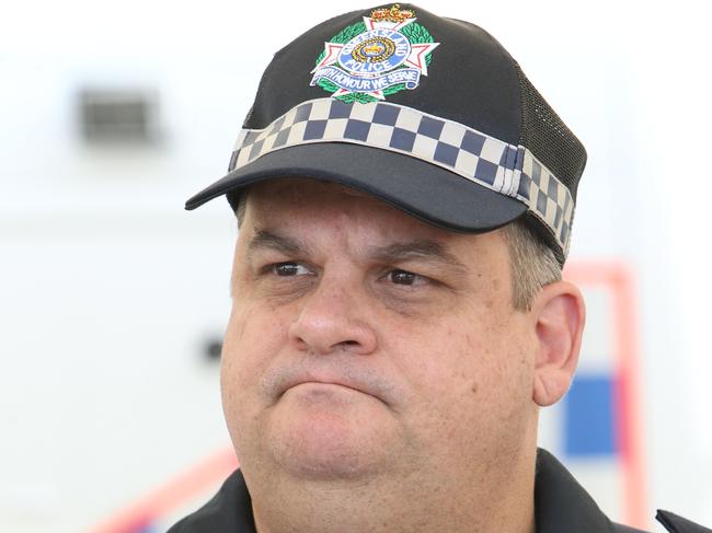 Senior Sergeant Nick Sellars of the QLD Police force taking part in Operation Bombous at 28 Dixon Drive, Pimpama, Junction Shopping Centre. Pic Mike Batterham