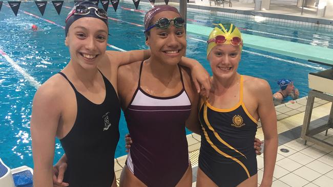 Queensland swimming is in good hands with this group coming through. Sophie Martin, Claveria Johnson-Tiamalu and Tiana Kritzinger after a podium finish at the QGSSSA meet.