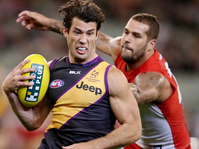 AFL Round 8. Richmond v Sydney Swans at the MCG. Alex Rance tries to shake the chasing Lance Franklin  . Pic: Michael Klein