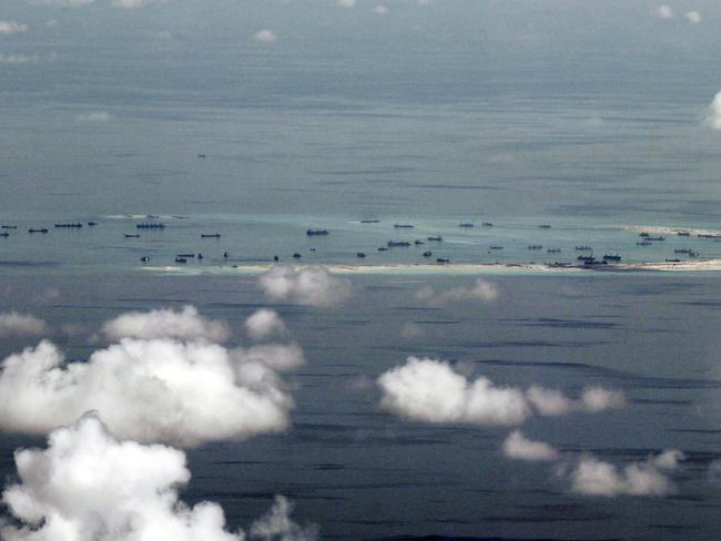 This May 2015 photo, shows land reclamation of Mischief Reef in the Spratly Islands by China. Picture: Ritchie B Tongo/AP