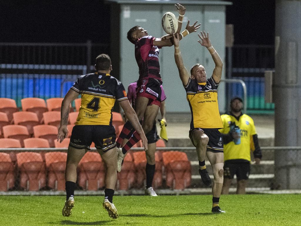 Alexander Hinch leaps for the ball against Gatton. Picture: Kevin Farmer.