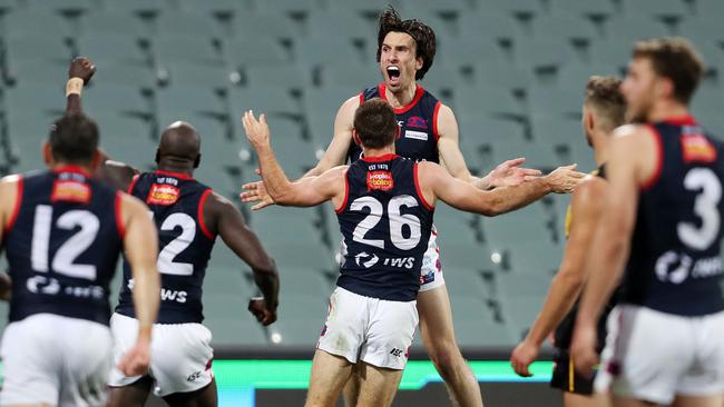 Norwood captain Matthew Panos celebrates with Richard Douglas. Picture: Sarah Reed