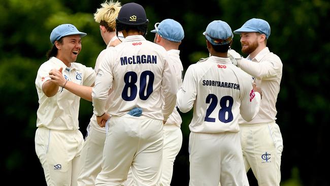 Ivanhoe players celebrate a wicket. Picture: Josh Chadwick