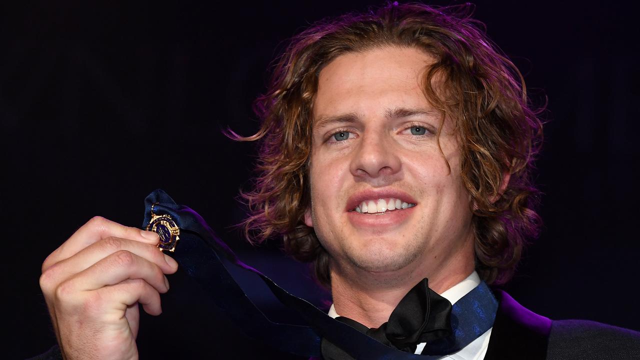 Nat Fyfe holds the Brownlow Medal. Photo: Quinn Rooney/Getty Images.