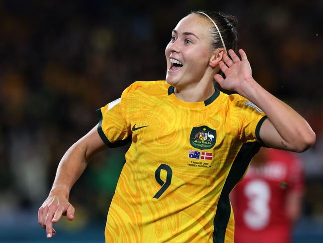 Australia's forward #09 Caitlin Foord celebrates after scoring a goal during the Australia and New Zealand 2023 Women's World Cup round of 16 football match between Australia and Denmark at Stadium Australia in Sydney on August 7, 2023. (Photo by STEVE CHRISTO / AFP)