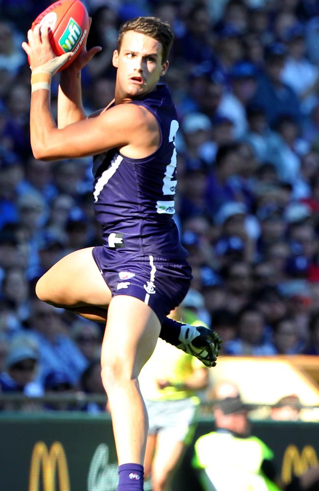 Harley Balic marks for the Dockers.