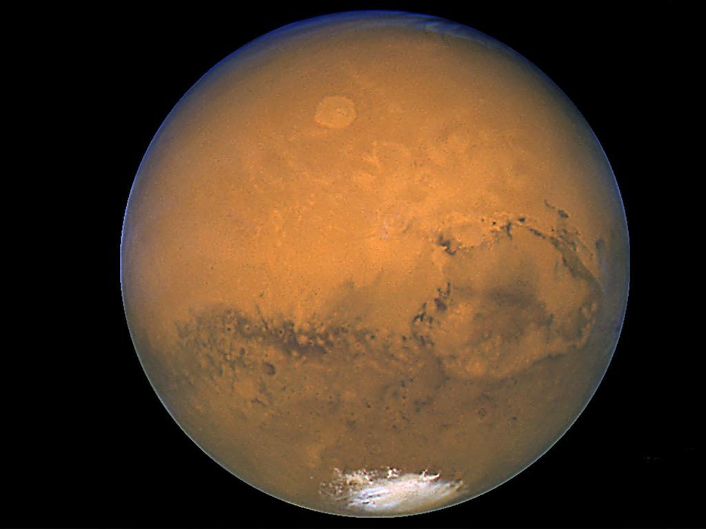 This image was taken within minutes of Mars’ closest approach to Earth in 60,000 years, on August 27, 2003. In this picture, the red planet is 55,757,930km from Earth..