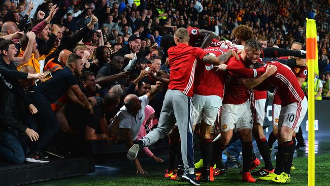 Marcus Rashford of Manchester celebrates scoring.