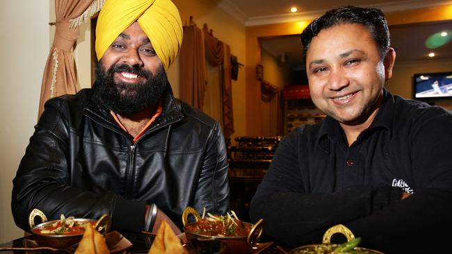 Blacktown Curry Festival organiser Bikram Cheema with Haveli Indian Restaurant owner Resham Singh of Harris Park.