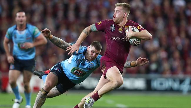 Cameron Munster of the Maroons in action. Picture: Getty