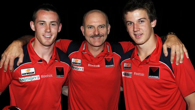 Demons coach Dean Bailey with Tom Scully and Jack Trengove after the 2009 draft.