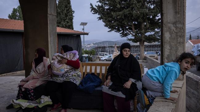 A displaced Lebanese family on Saturday outside a church in Deir Al-Ahmar, Lebanon. Picture: Getty