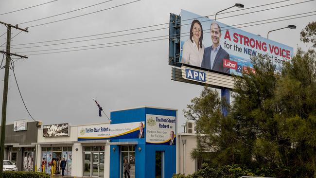 Labor candidate Rowan Holzberger has put up a billboard out the front of Federal Member for Fadden Stuart Robert's office in Labrador. Picture Jerad Williams